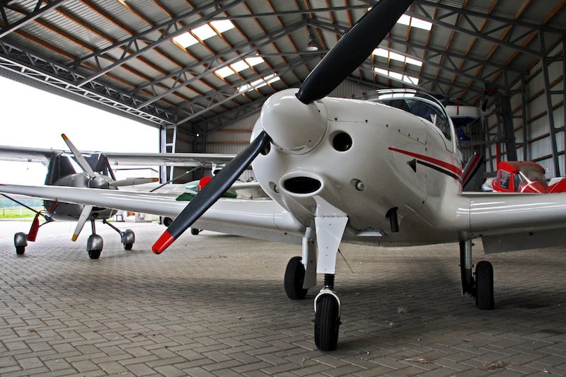Small airplane in hangar. 